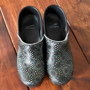 Dansko Black and Multicolor Patterned Clogs